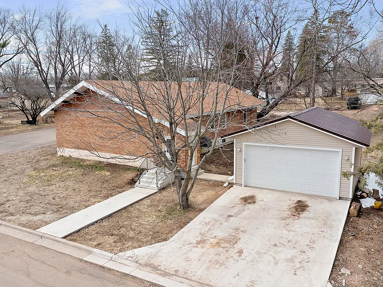 Drone photo of unit and garage.