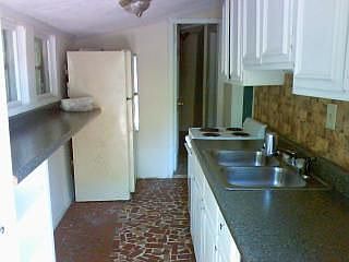Galley Kitchen W/ bar