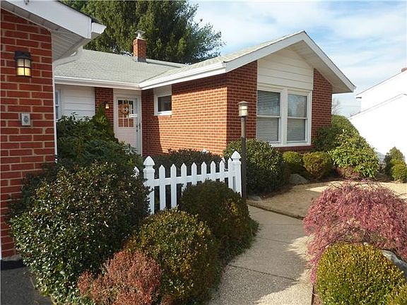 Enticing curb appeal invites a closer look!