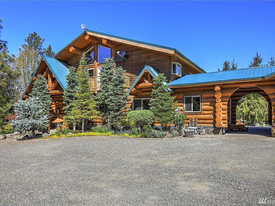 Welcome to 2982 Lambert Rd Cle Elum. This 4500 sq foot log home is secluded on a lavish 25 acres of stunning grounds. Not to mention the 6 car shop and amazing stables for the horses. 