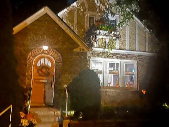 Well lit street, activity triggered front porch light.