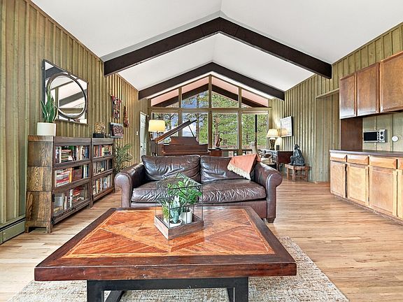 Great room with seating and piano