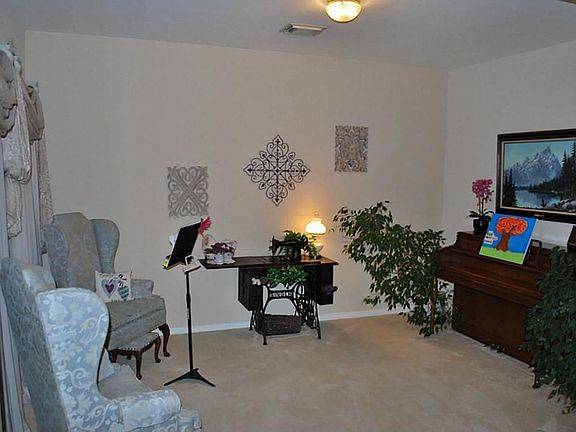 Use the formal living as a living room, or s music room, library, or study.