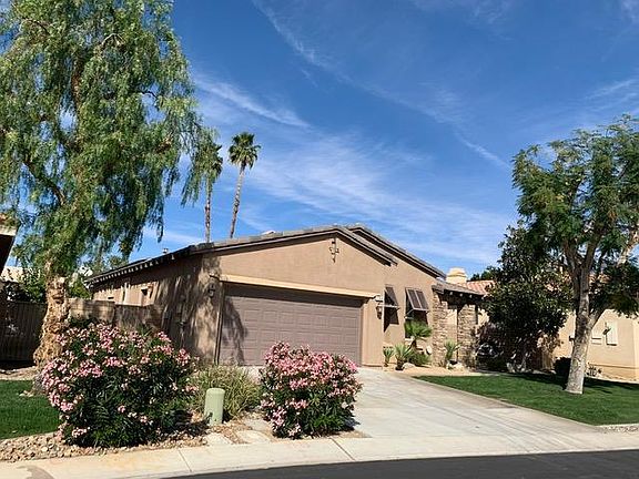 Front of home with 2-car garage.