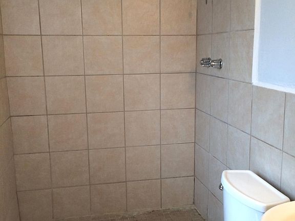 Bathroom view as you walk in! Scale is generous: 5' x 8'