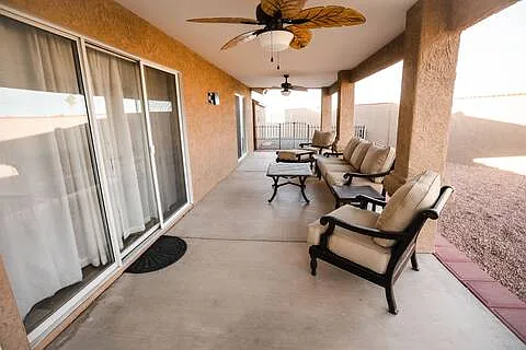 Covered patio with plenty of seating for entertaining