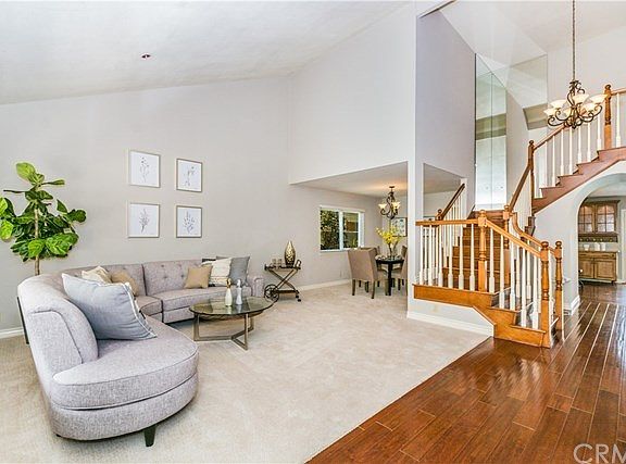 Spacious Entry leading to Living Room, notice the vaulted ceilings!