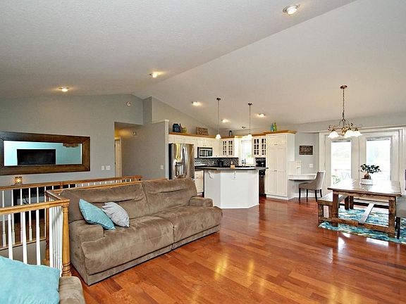 Beautiful open concept main level with maple flooring and tons of natural lighting throughout!