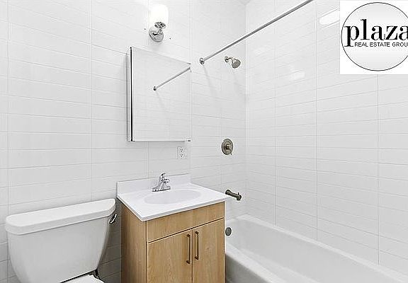 5th image of 214 E 9th St APT 1D