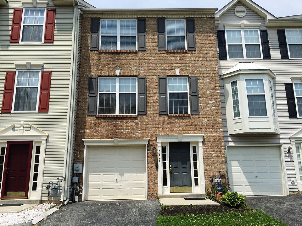 Brick front with 1 car garage & off-street parking