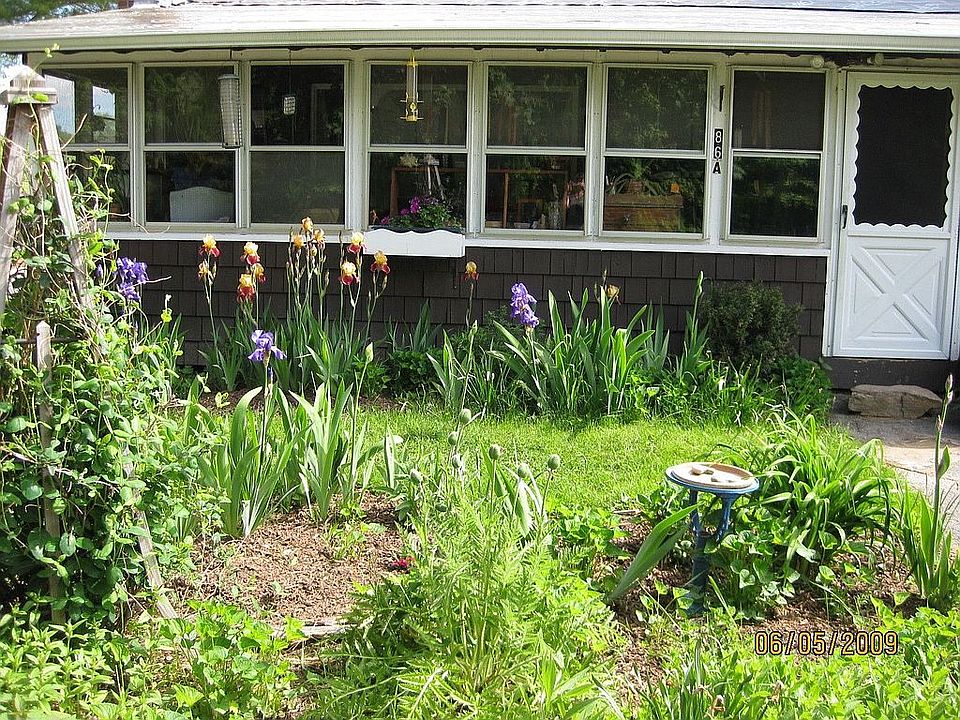  2 bedroom cabin style with perennial gardens