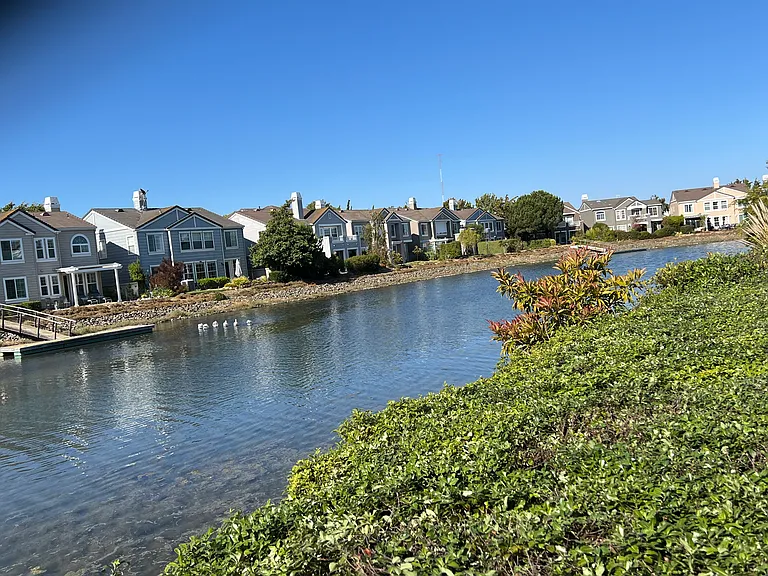 Waterviews of the lagoon and surrounding homes across