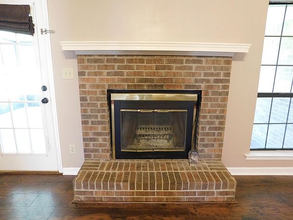 Wood burning fireplace in living room