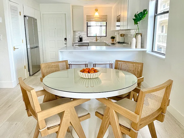Bright and airy dining with glass top for easy clean up