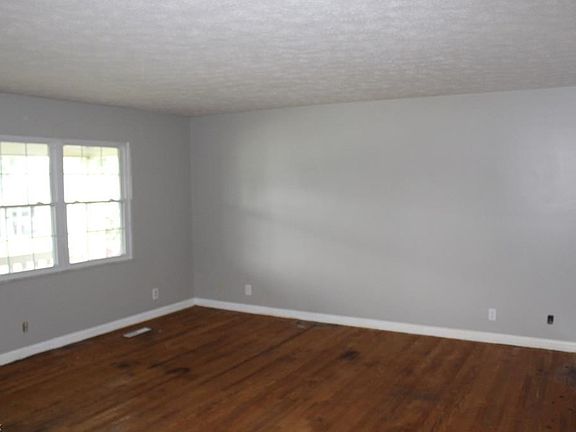 Huge Living Room (19 x 15) with hardwood flooring.