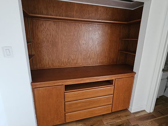 Built in cabinet in living area.