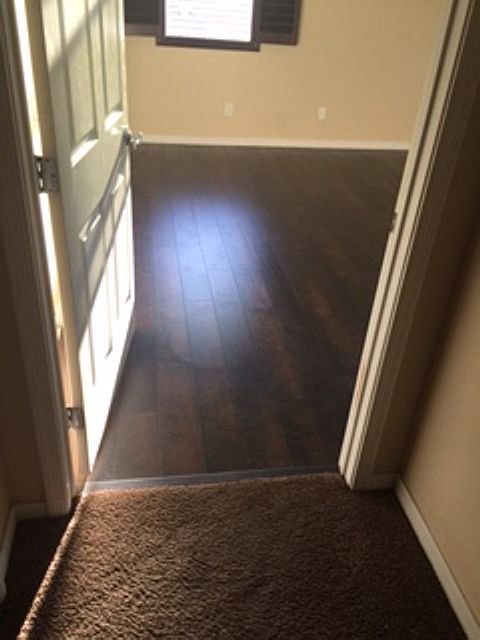 Master bed w/ new flooring
