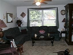 Living room opens to kitchen
