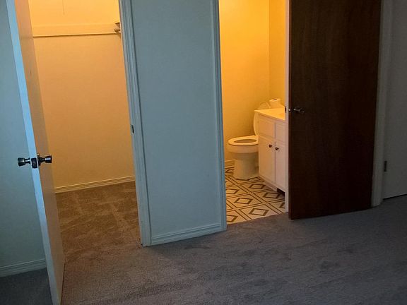 1/2 bathroom and closet in master bedroom