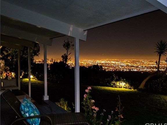 Mesmerizing city lights view at night from the back deck, family room, living room, den and master suite!