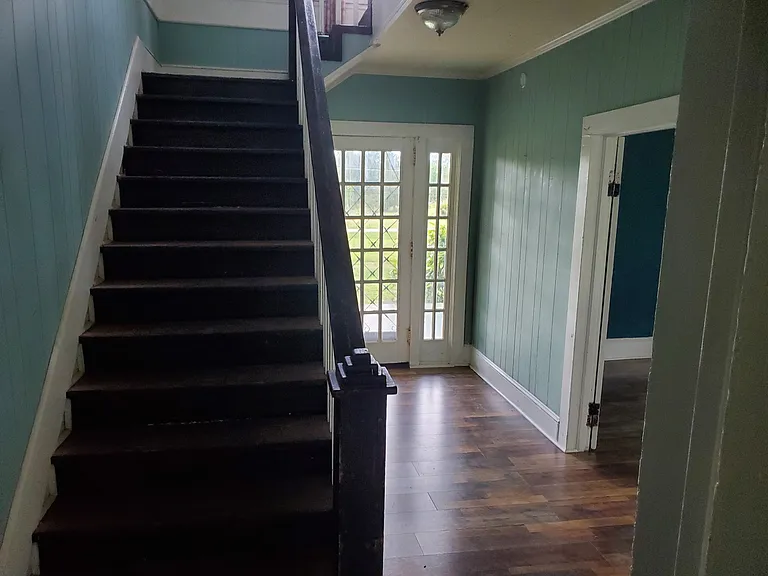 Stairway, looking toward front door