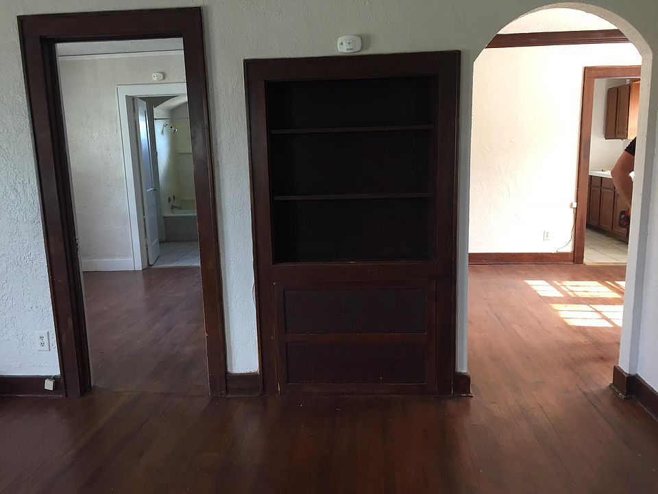 Living room, looking into the bedroom and kitchen