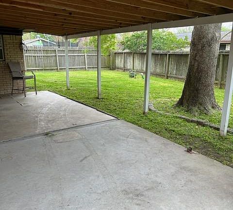 Large, covered patio space great for get-togethers, cookouts, and parties with family and friends