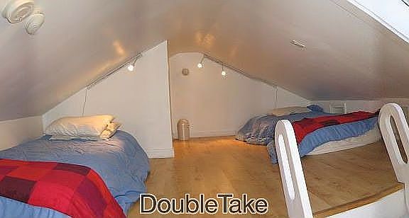 large loft with 2 areas for beds