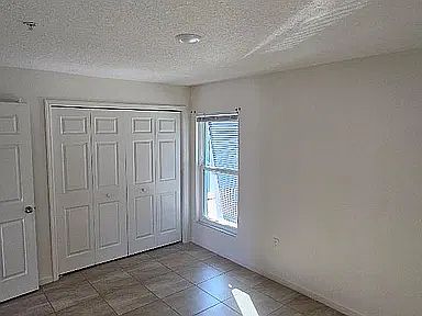 Spacious Tile Bedroom