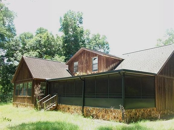 Back of home w/covered porch