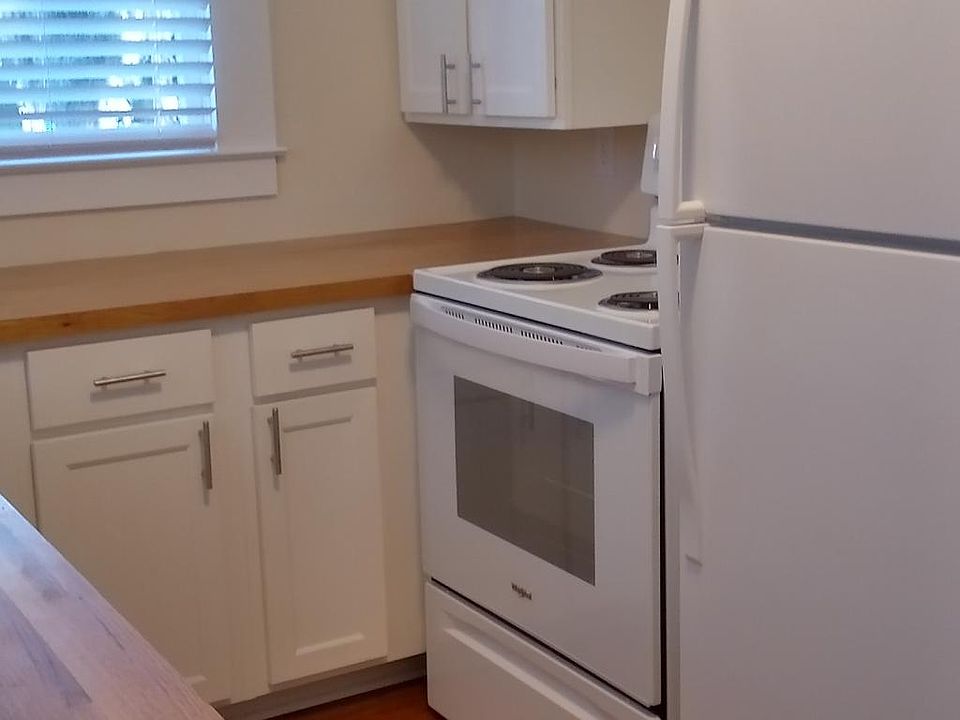 Kitchen
Refrigerator with ice maker, full size range.