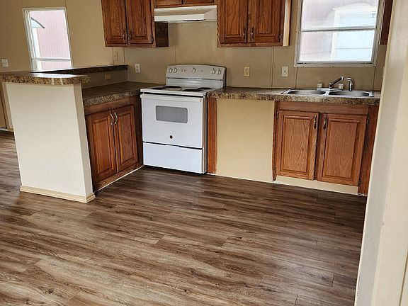 Kitchen and dining area with stove