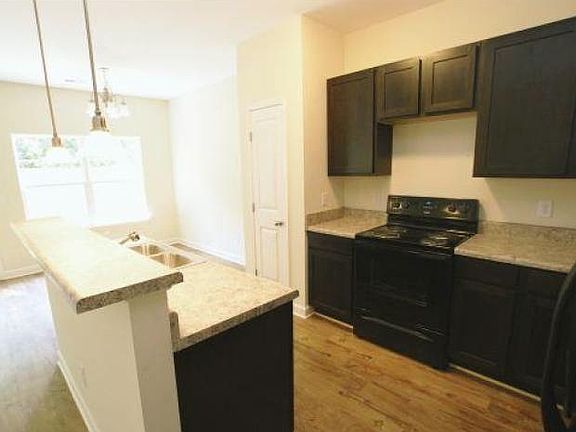 Black Appliances w/ side by side fridge