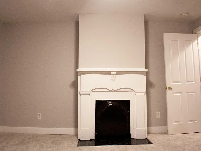 Primary bedroom, decorative fireplace