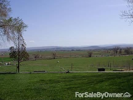 View of valley and farm land below