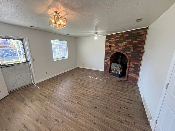 Access to the 2-car garage and covered back patio & fenced yard