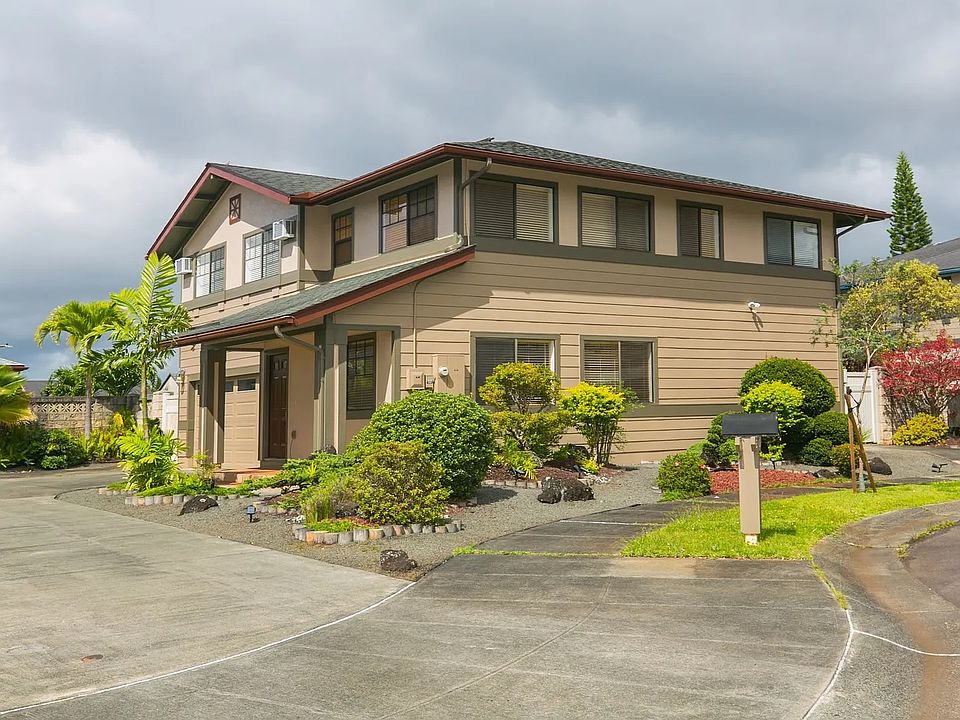 Front view of Japanese garden and long driveway