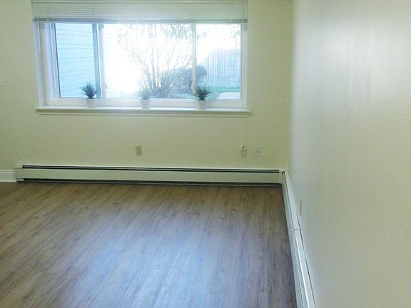 Living room area with closet 