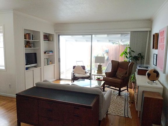 Living Room looking towards glass sliding door to rear yard.