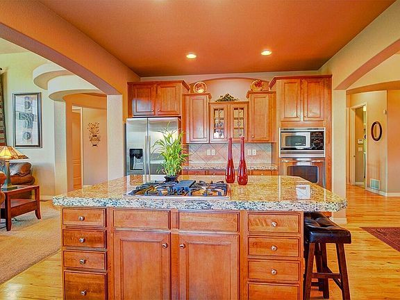 Spacious kitchen with granite countertops