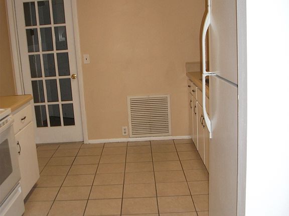 Kitchen with door to laundry