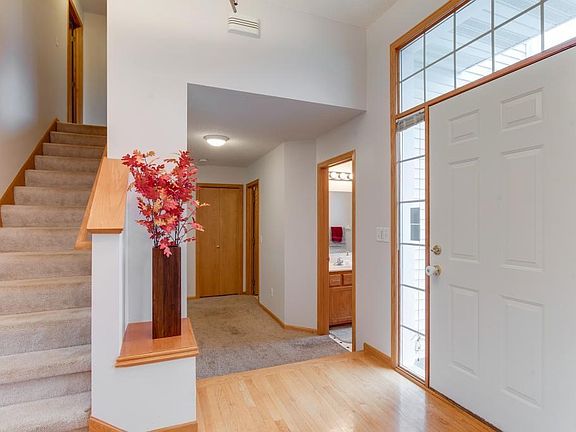 Unique floor plan allows additional access to garage, laundry & guest bath