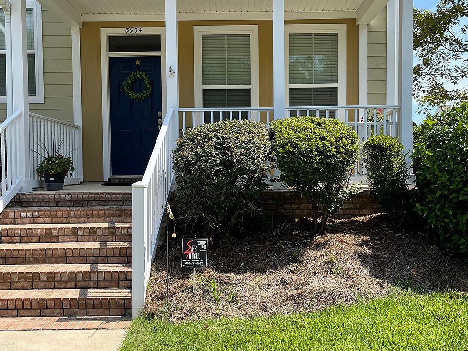 Beautiful Entry with a spacious front porch to sit and relax