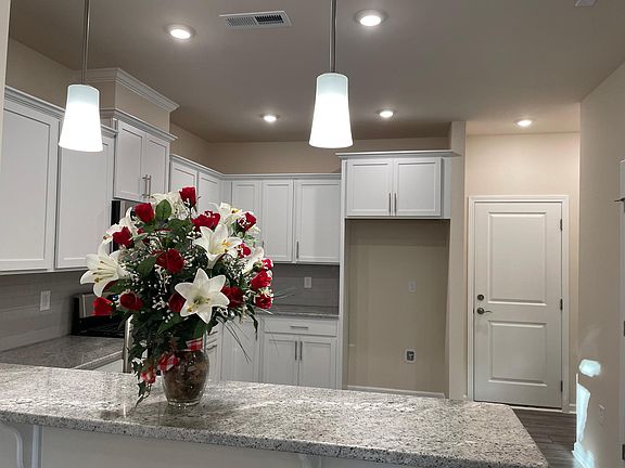 Kitchen with upgrade granite, cabinets and faucet