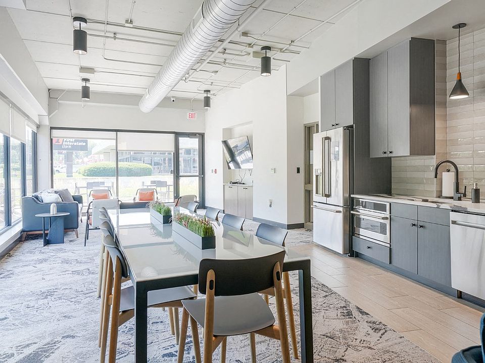 Our entertainment suite features a modern kitchen and dining area, perfect for hosting gatherings.