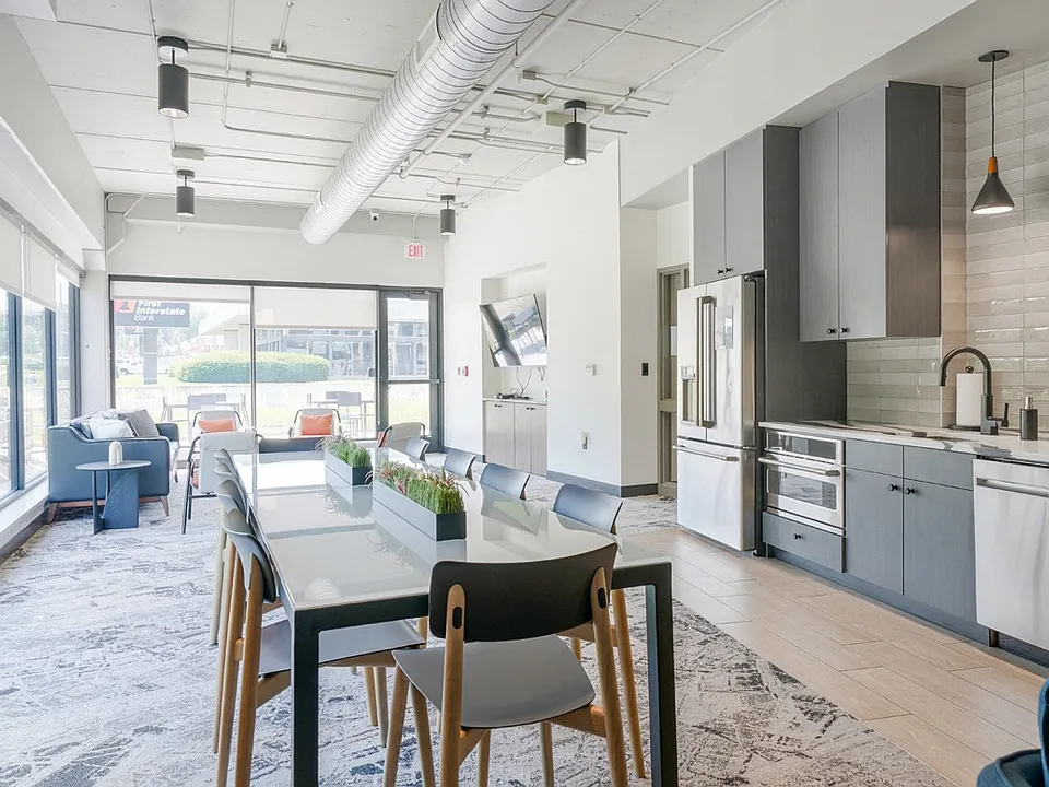Our entertainment suite features a modern kitchen and dining area, perfect for hosting gatherings.