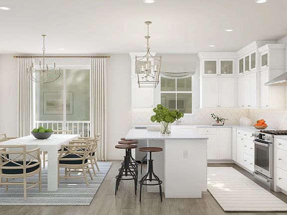 Kitchen with quartz island and countertops