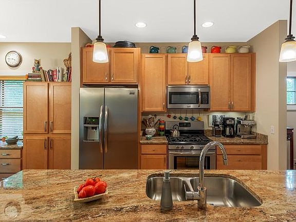 Kiitchen with SS Appliances and Gas Stove