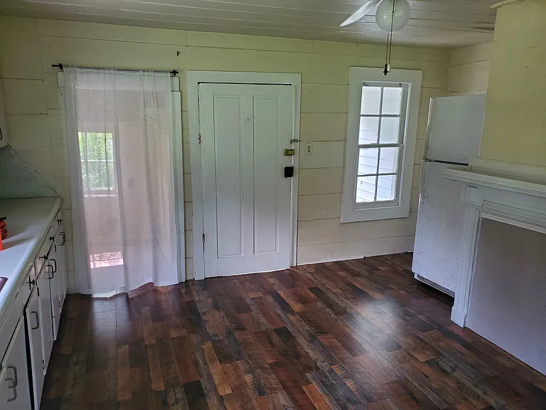 Kitchen, showing door onto West Side Porch