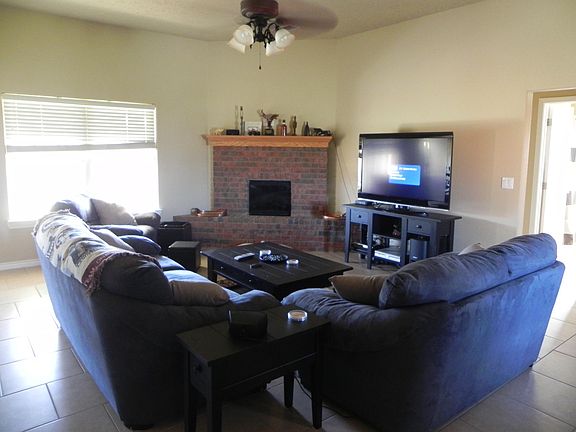 Great natural light in living room with great electric fireplace for the cold winter days